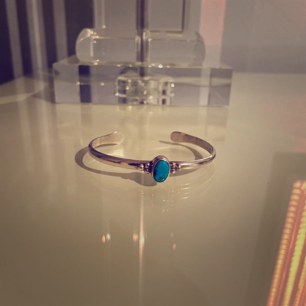Sterling cuff with turquoise center stone
